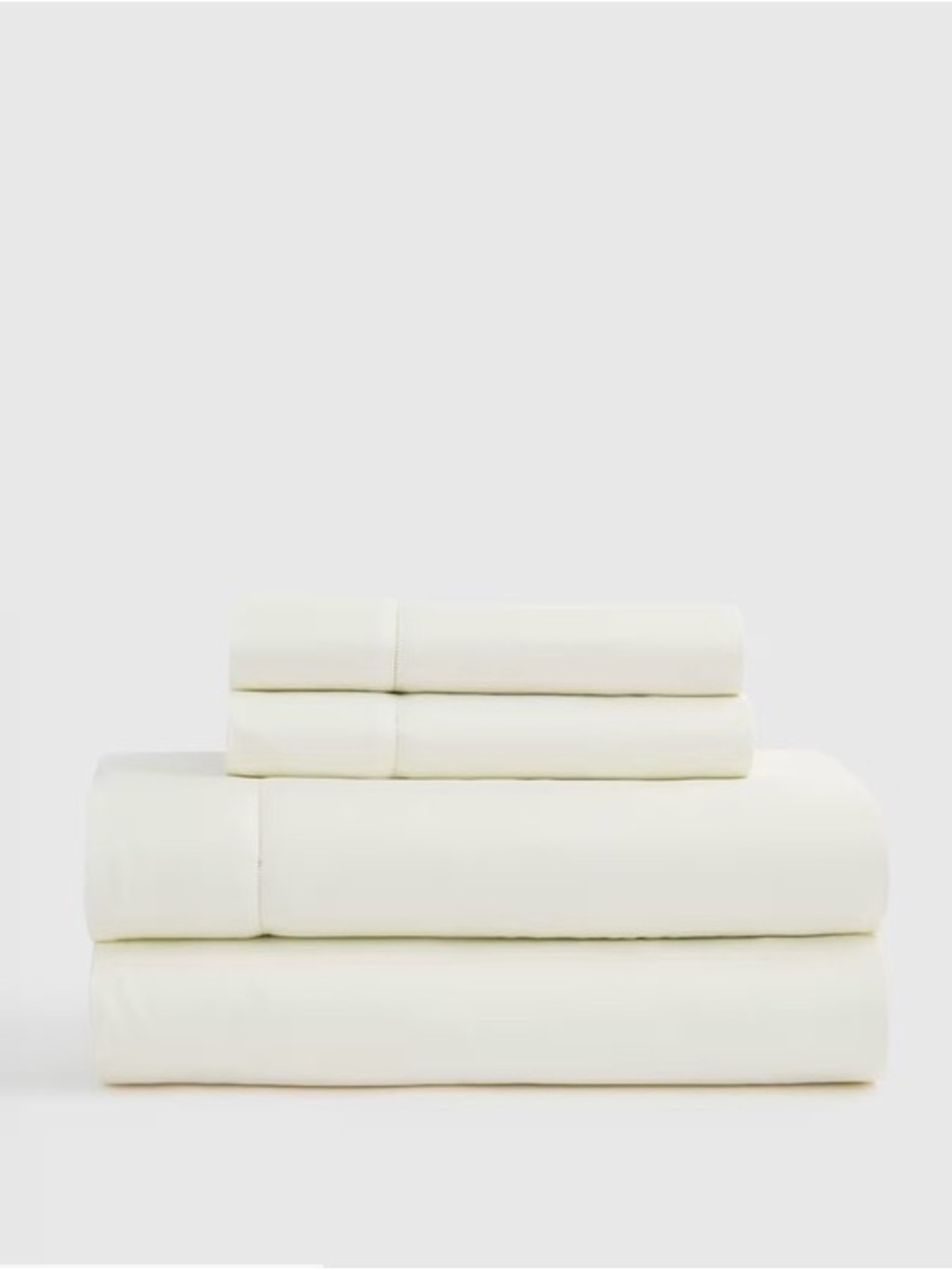 Quince organic cotton sateen twin size fitted sheet and pillowcase in ivory